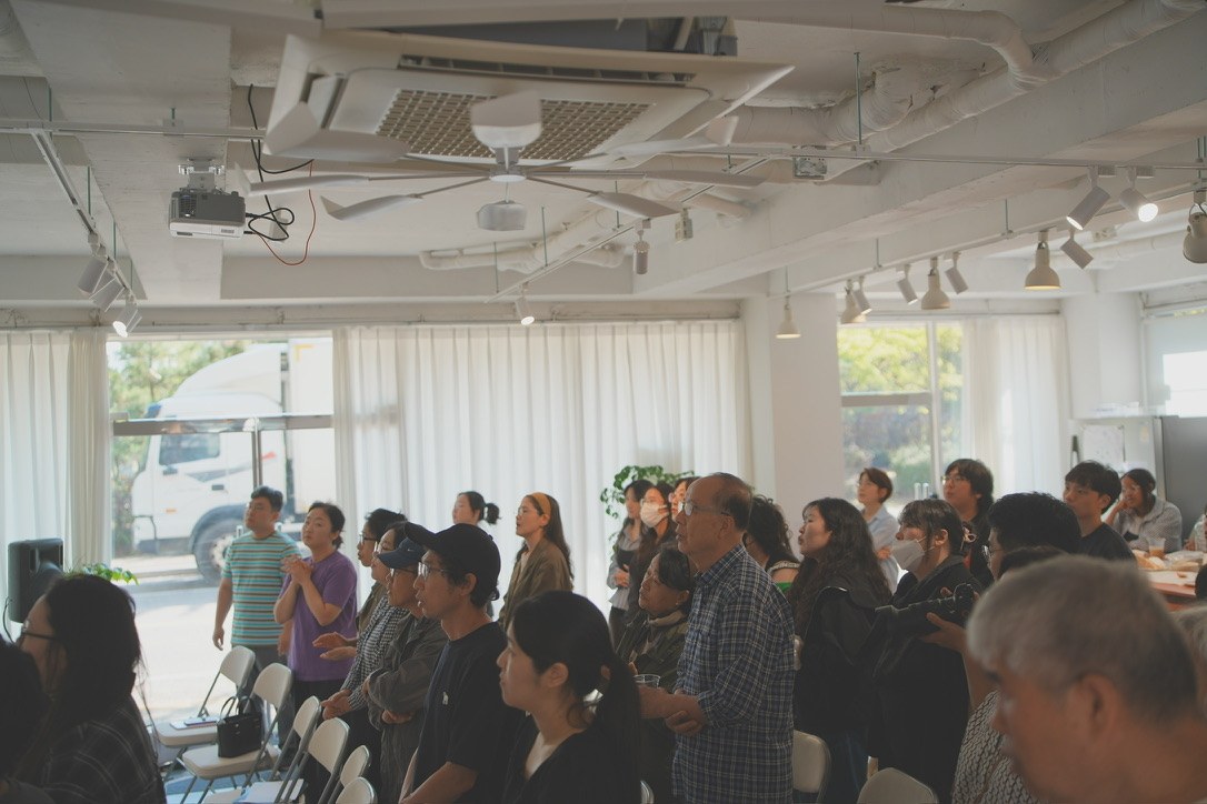 People from different nations worshipping together at Bridge International Church